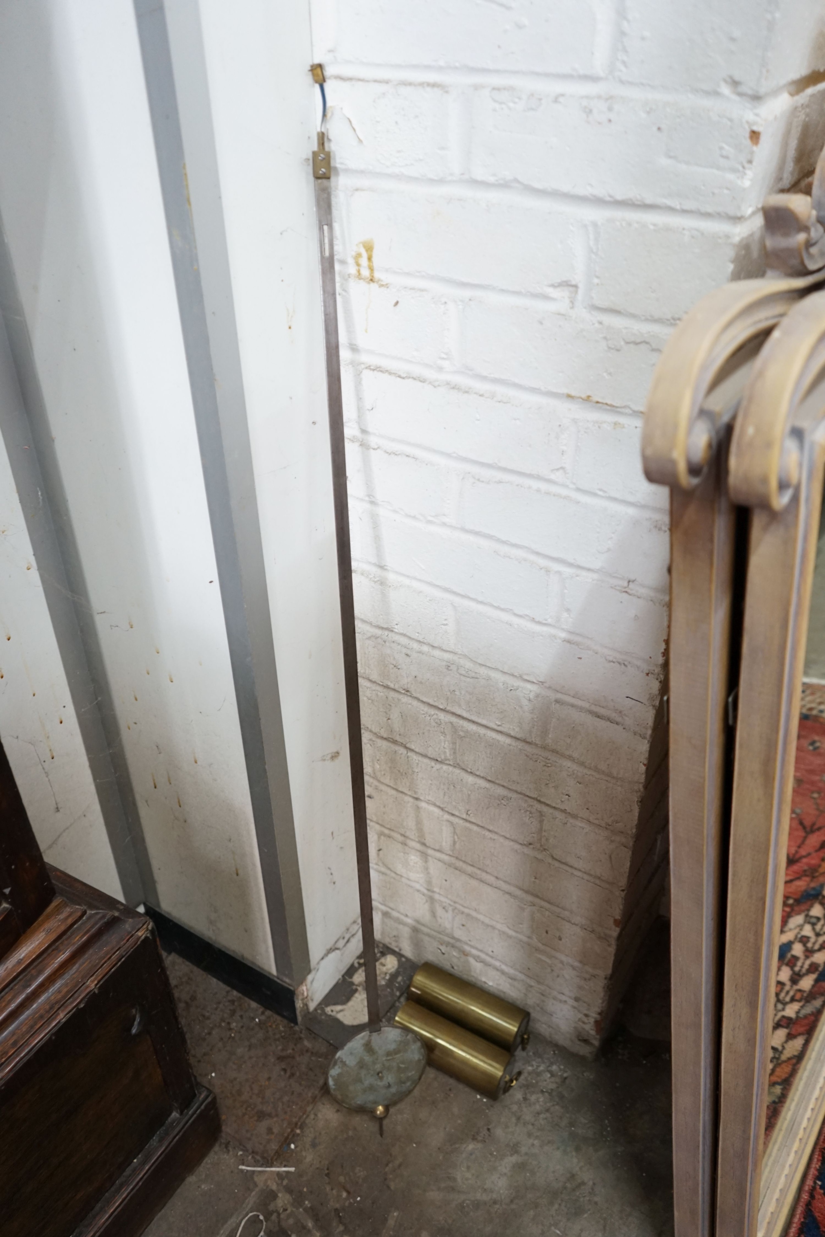 A George III style oak cased longcase clock with silvered chapter ring, height 197cm